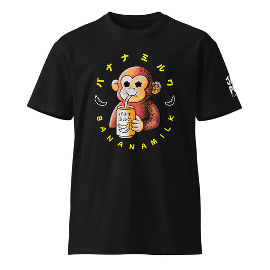 Graphic T-shirt with a cute monkey drinking banana milk illustration inspired by Japanese pop culture and snack humor.