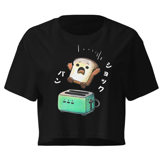 Japanese-inspired crop top featuring Shock Pan (ショックパン), a hilariously surprised loaf of bread character inspired by Japanese wordplay and humor.