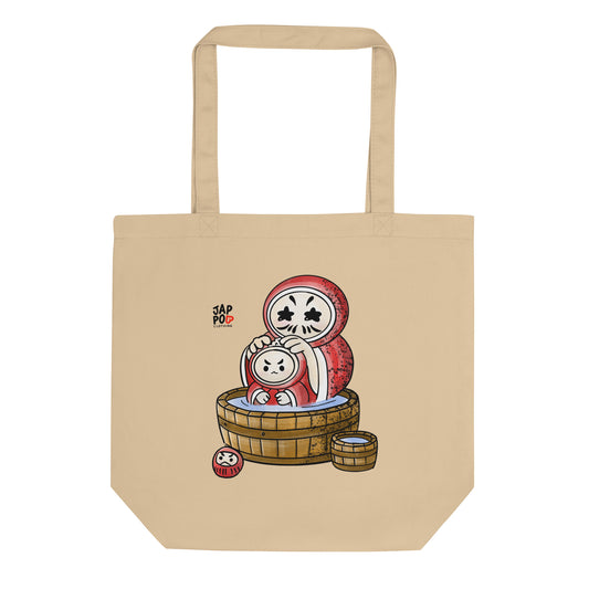 Eco tote bag featuring a cute Daruma family soaking in a bubbly bath.