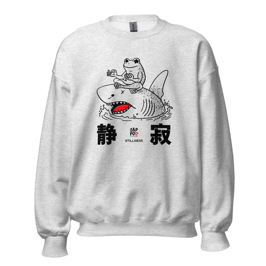 Unisex sweatshirt featuring a calm frog meditating on a shark, symbolizing stillness and balance.