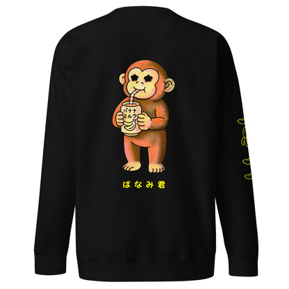 Banami-kun sweatshirt featuring a cute monkey drinking banana milk in a playful Japanese JapPop illustration style